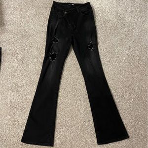 Fashion Nova black crossover flare jeans. Size 5.